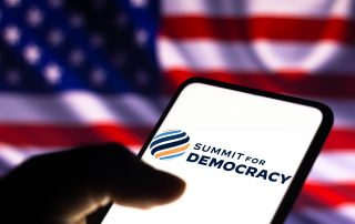 summit for democracy logo in front of american flag