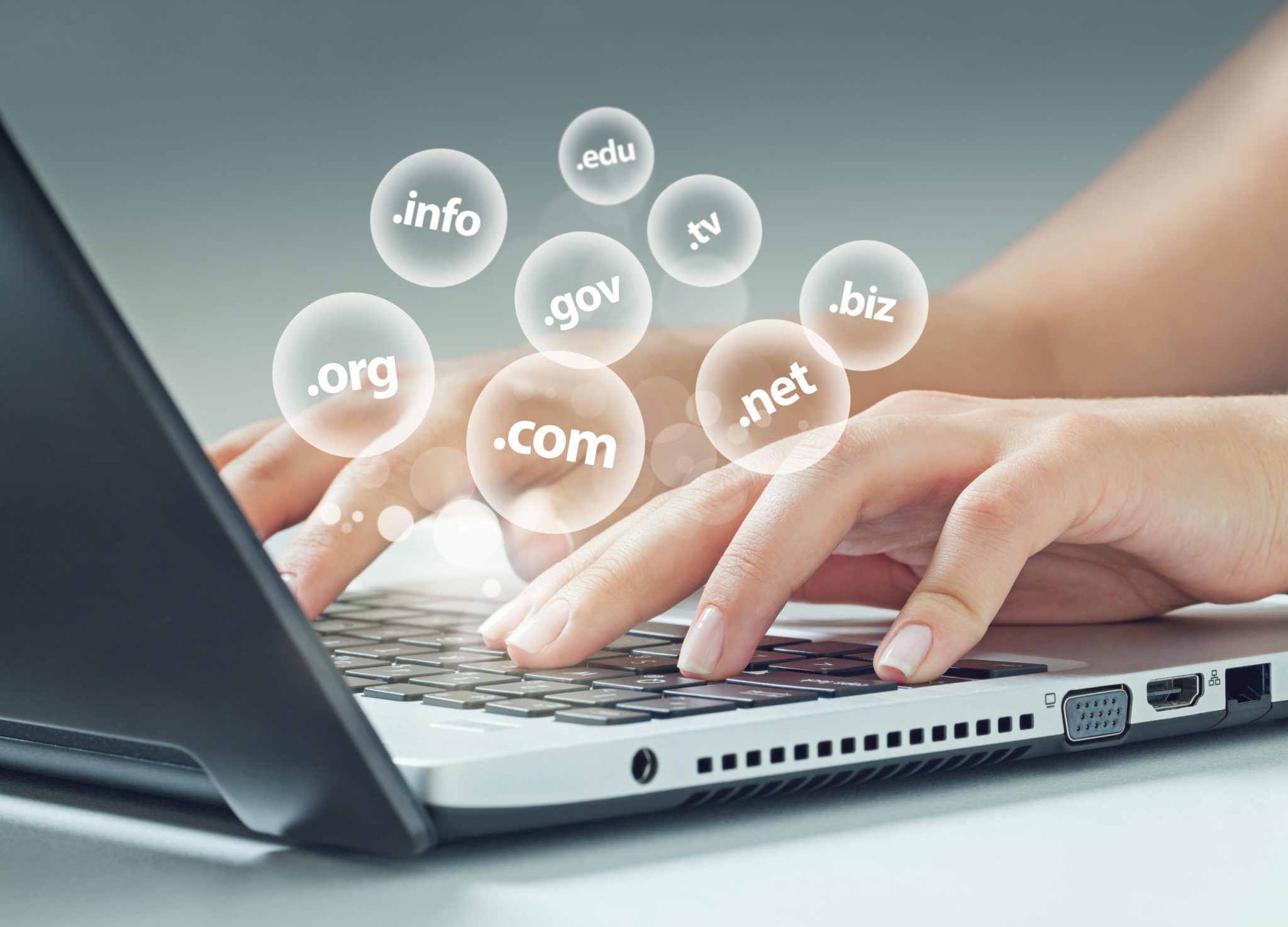 woman typing choosing a domain name