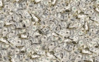 piles of U.S. dollars