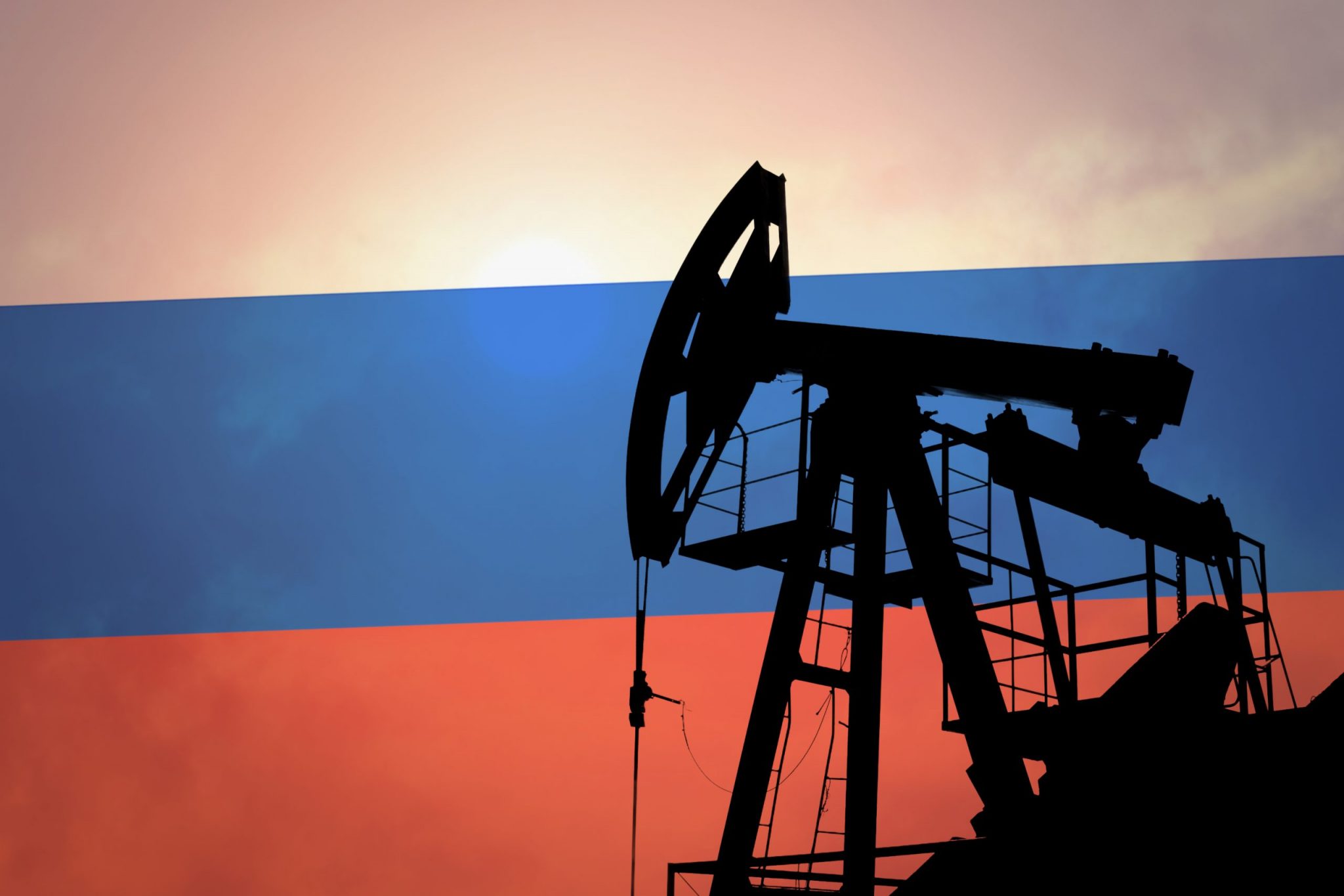Oil pump on background of flag of Russia