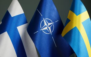 Flags of Sweden, Finland and NATO.