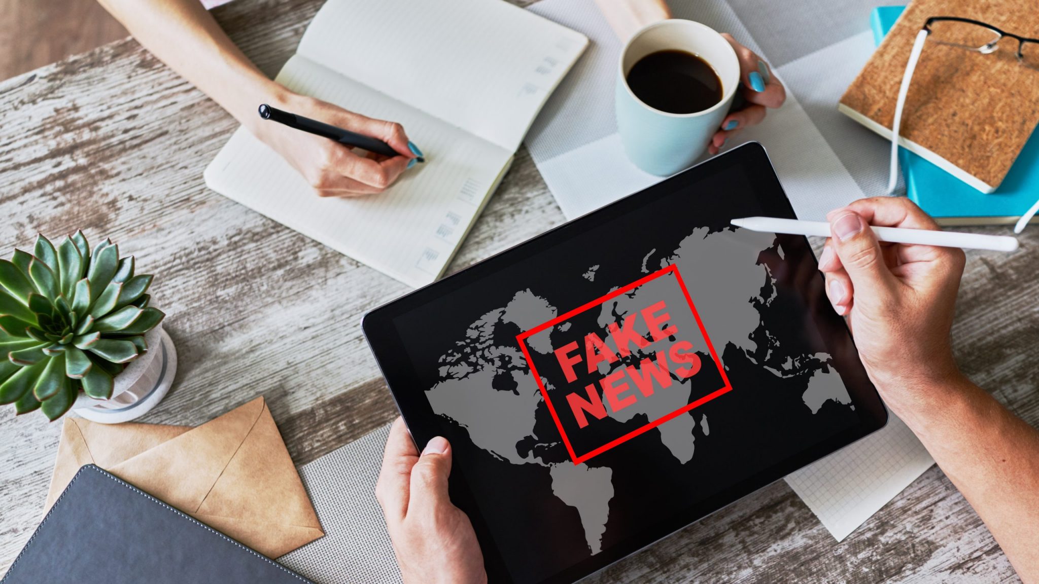 Fake news sign on screen. Propaganda and disinformation. Media and internet concept.