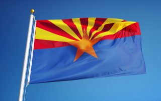 Arizona (U.S. state) flag waving against clear blue sky, close up, isolated with clipping path mask alpha channel transparency, perfect for film, news, composition
