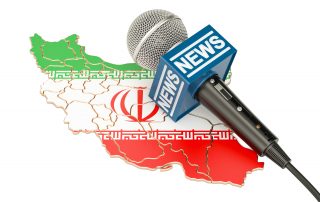 Iranian News concept, microphone news on the map of Iran