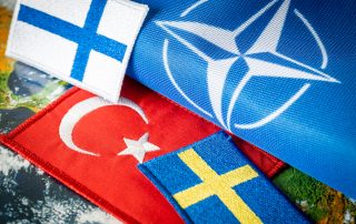 15, May, 2022, Turkish flag next to the flags of Finland and Sweden Concept of a political conflict between a member of the North Atlantic Pact and candidates aspiring to join NATO