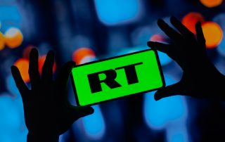 February 27, 2023, Brazil. In this photo illustration, the Russia Today (RT) logo seen displayed on a smartphone