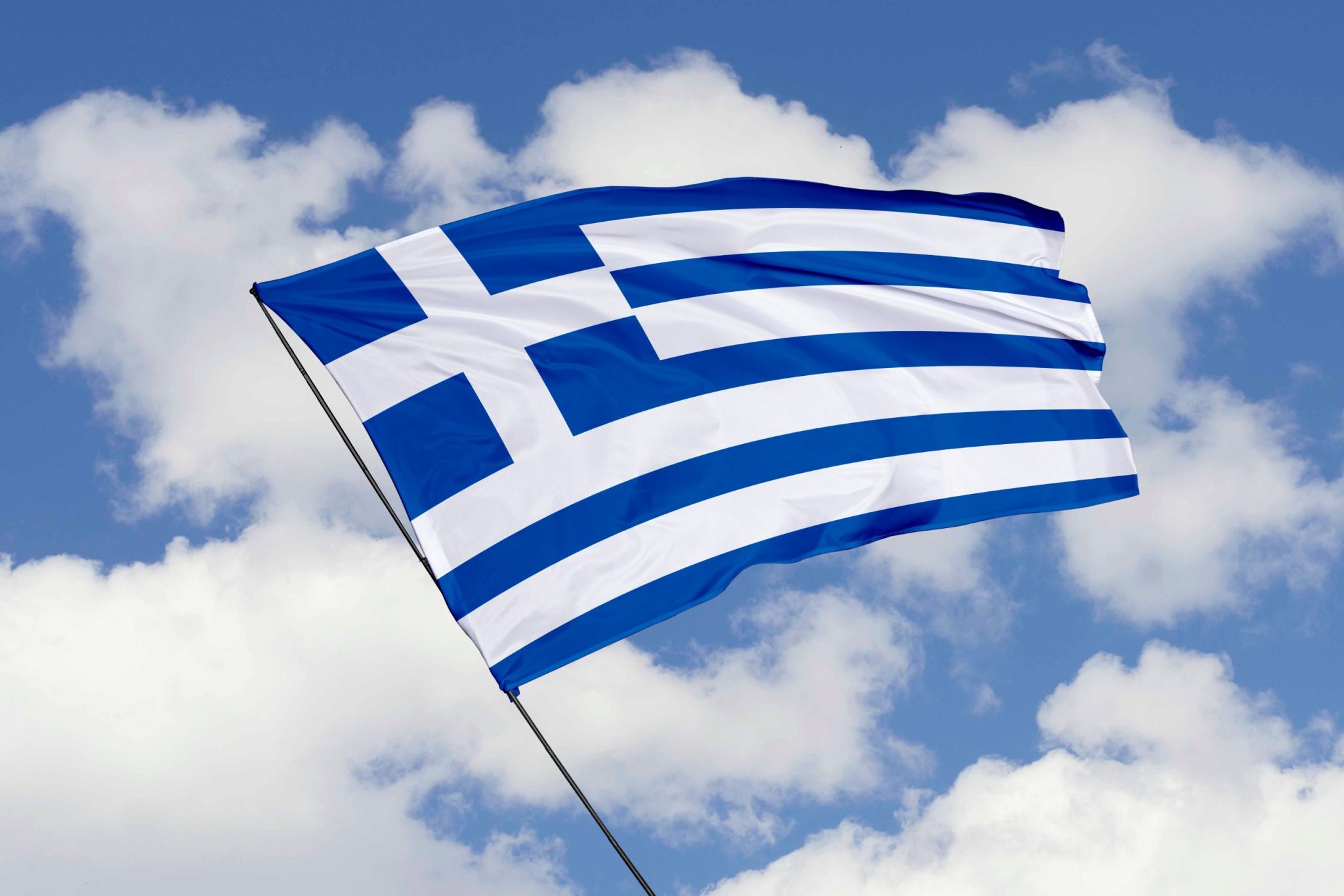 Greece flag isolated on sky background with clipping path
