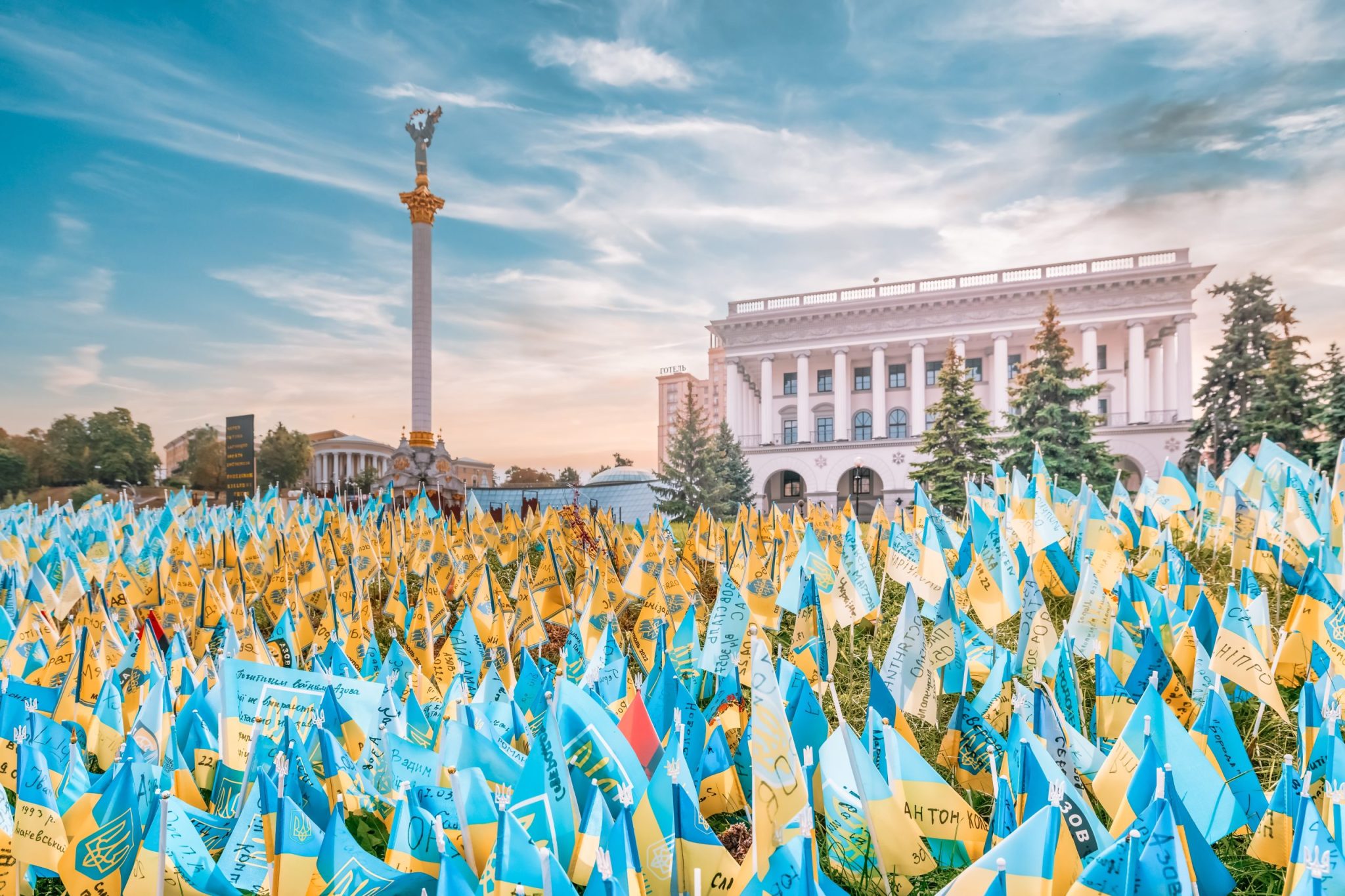 KYIV, UKRAINE - August 23, 2022: Independence Square, with yellow and blue flags, in memory of the fallen defenders of Ukraine during wartime in Ukraine